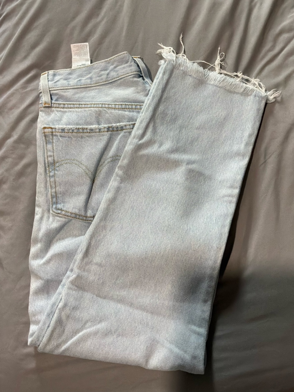 Levi's Light Blue Distressed Hem Denim Jeans